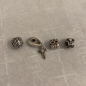 Pandora charms present cross flower scrolls